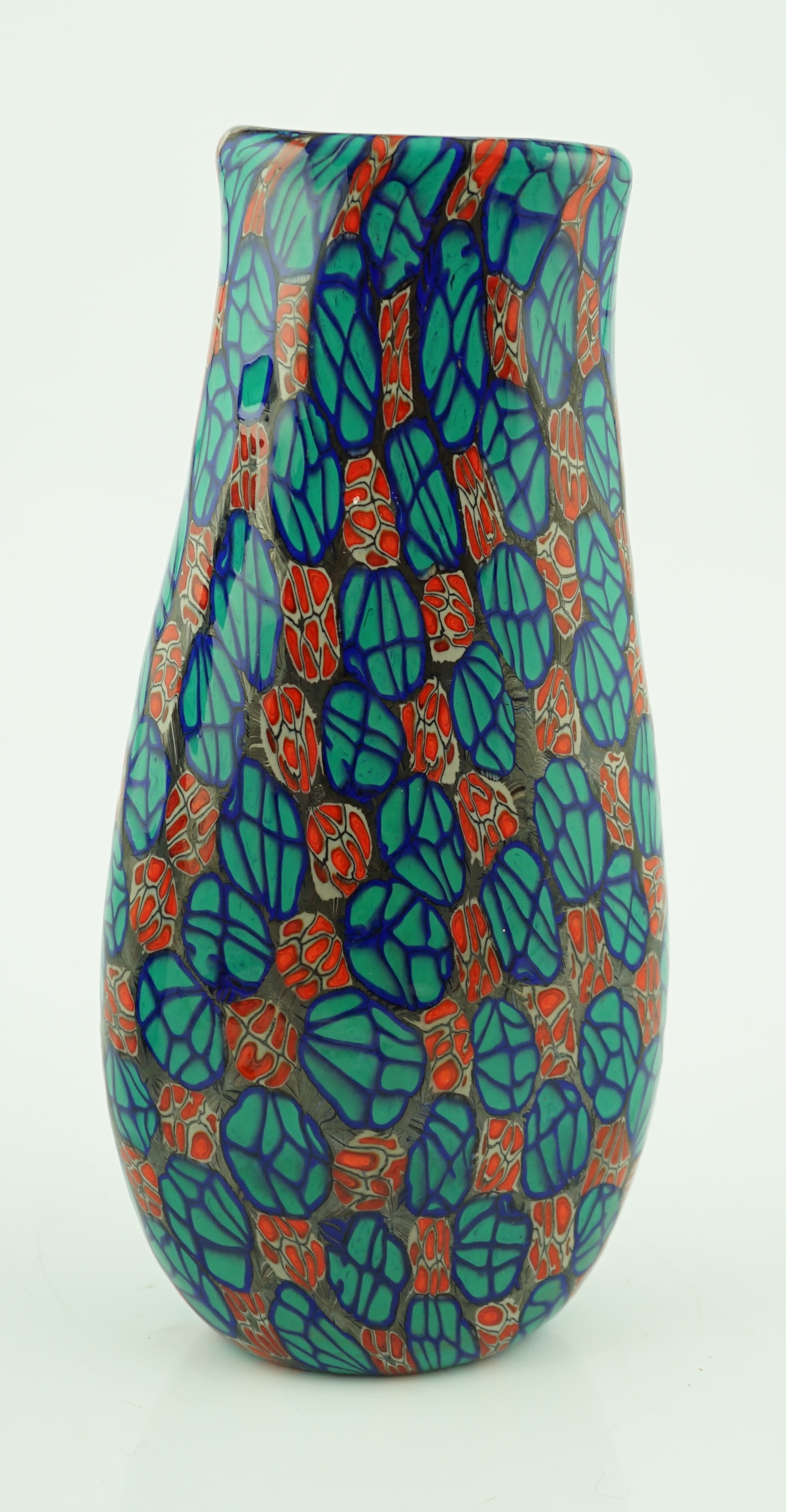 Vittorio Ferro (1932-2012) A Murano glass Murrine vase, the flattened oval baluster body, with a spiral design of red flowerheads and green leaves, on a blue ground, unsigned, 35cm, Please note this lot attracts an addit